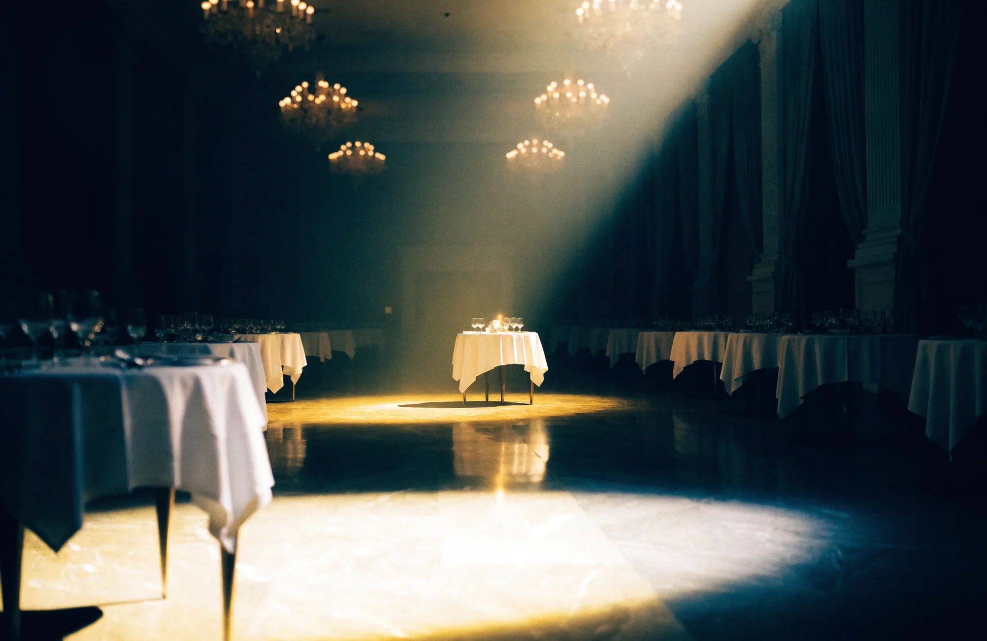 A vast empty fine dining room at night